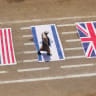 IRANIAN PROXY: University student treads on US, Israeli, and UK flags during a parade at Sana’a University campus to show support for the Houthis, in Yemen, July 22. 