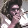 Film strip frame: Soldier blows a shofar (1948-era).