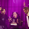 NUNU BLOWS OUT the candle on her five-year career cake, alongside Guri Alfi (right), at the Barby last weekend
