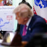 A map naming Lake Ontario as "Lake America" is displayed as U.S. President Donald Trump signs an executive order during an event in the Oval Office of the White House on August 27, 2026 in Washington, DC.