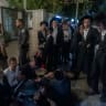 Ultra-Orthodox Jewish protesters demonstrate against an IDF recruitment conference for the Haredi community in Jerusalem, August 4, 2026.