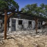 A view of homes destroyed and burned in the Hamas October 7, 2023 massacre at Kibbutz Nir Oz, near the Israel-Gaza border, August 5, 2026.
