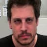 British far-right political commentator Milo Yiannopoulos, who has called for supermarket ICE checkpoints and summary deportation of anyone failing to prove legal U.S. residency, poses after his arrest by federal immigration agents at the Louis Armstrong New Orleans International Airport in Kenner, 
