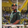 Muhoozi Kainerugaba, son of Yoweri Museveni and Uganda's Chief of Defence Forces, inspects a military parade from a vehicle during the inauguration ceremony of his father following his re-election as president at the Kololo Ceremonial Grounds in Kampala on May 12, 2026.