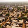 (Illustrative) A drone picture shows a suburb following the attack on the international airport in Niamey, Niger, on January 30, 2026.