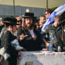 Ultra-Orthodox Jewish protesters demonstrate against the recruitment of ultra-Orthodox Jews to the IDF outside the IDF recruitment center at Tel Hashomer in central Israel, August 30, 2026.