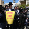 Haredi demonstration in front of the military recruitment office in Jerusalem, April 12, with a sign that reads: ‘We will die and not enlist.’