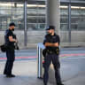 Police officers stand near the site of a deadly shooting at an event, according to the police, at a train station in Aarau, Switzerland, August 30, 2026.