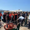 Survivors arrive on shore after being rescued from the sea following a boat capsize off Kyrenia, northern Cyprus, August 30, 2026