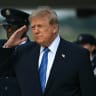 US President Donald Trump salutes after stepping off Air Force One at Joint Base Andrews, Maryland on August 28, 2026. 