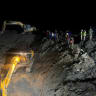 Rescuers use diggers to clear way to a tunnel of the Trishuli 3A Hydropower Project, following deadly flash floods and a mudslide, in Nuwakot district, Nepal, in this handout, obtained by Reuters on August 31, 2026.