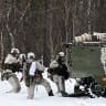 Norwegian troops attend a military demonstration at the Bardufoss Airbase in Norway on March 13, 2026.
