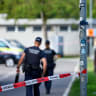 Empty bottles and cans on a wall at the Schachen horse racing track, following a deadly shooting incident at a rave party on Sunday, in Aarau, Switzerland, August 31, 2026. 