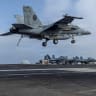 An F/A-18F Super Hornet, assigned to Strike Fighter Squadron 41, prepares to make an arrested landing on the flight deck of Nimitz-class aircraft carrier USS Abraham Lincoln during the ongoing conflict with Iran August 4, 2026. 