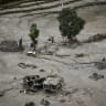 An aerial view shows buildings and a car damaged and covered in mud near Trishuli River following deadly flash floods and a mudslide, in Betrawati Bazaar in Rasuwa district, Nepal, August 30, 2026.