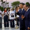 China's President Xi Jinping and his Egyptian counterpart Abdel Fattah al-Sisi wave upon his arrival at the Cairo International Airport, in Cairo, Egypt, September 1, 2026.
