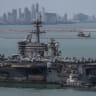 The US Navy Nimitz-class aircraft carrier USS Abraham Lincoln sails toward Laem Chabang Port before docking for a rest stop in Chonburi province, Thailand, September 2, 2026. 