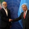 Iranian President Masoud Pezeshkian (L) shakes hands with the United Nations (UN) Secretary General Antonio Guterres during the UN's General Assembly.