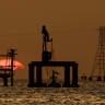 Oil platforms and pumpjacks at Lake Maracaibo, as residents around the oil‑rich center of Maracaibo in Zulia state remain uncertain about new investments following recent legislative reforms allowing greater private participation in PDVSA and aimed at revitalizing the country's struggling oil sector