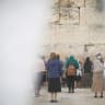 WOMEN STAND in prayer at the Kotel.
