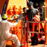 Rescuers help a migrant disembarking from a Spanish coast guard vessel at the port of Arguineguin, on the island of Gran Canaria, Spain, September 3, 2026. 