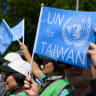 A pro-Taiwan protester holds a flag during a demonstration outside of the United Nations offices on the opening day of the World Health Assembly (WHA), the World Health Organization's annual meeting, on May 22, 2017, in Geneva.