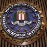 The seal of the FBI hangs in the Flag Room at the bureau's headquaters.