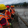 Rescue workers build a makeshift zip line to cross the Trishuli River, following the deadly flash floods and a mudslide, in Devighat, Nuwakot district, Nepal, September 4, 2026.