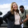 Dr. Amy Acton, Ohio Democratic gubernatorial candidate and former director of the Ohio Department of Health, is fitted with a microphone during a rally on April 28, 2026 in Cincinnati, Ohio.