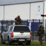 German special police forces secure the area on the day of German Chancellor and Christian Democratic Union (CDU) party leader Friedrich Merz, and Saxony-Anhalt State Prime Minister and top candidate Sven Schulze visit to UPM Biochemicals in Leuna, Germany, September 3, 2026. 