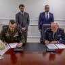 US Major General Jasper Jeffers, who leads the ISF mission, and Commander of the Kosovo Security Force Lieutenant General Bashkim Jashari sign a document of Kosovo joining the ISF mission, published September 7, 2026.