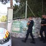 Police officers patrol in front of the entrance of the Musee Renoir after four paintings, together valued at nine million euros, were stolen in an early-morning break-in, with two recovered in the museum's garden and two still missing, in Cagnes-sur-Mer on September 8, 2026.