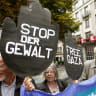 Protestors display posters demanding 'Stop the violence' and 'Free Gaza' during a demonstration for peace in Palestine, in Zurich 2014.