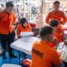 Rescuers work at a command post during an operation after the Virgo Transport 8 ship, according to a search and rescue agency, sank while sailing from Surabaya in East Java to Banjarmasin in South Kalimantan, at Trisakti port in Banjarmasin, South Kalimantan province, Indonesia, September 13, 2026.