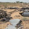 ) In this handout screen grab captured from a video provided by Houthi Media Center, Yemeni Houthi group fighters inspect debris from a Karayel drone of the Saudi-backed forces after it was downed by the Houthi-run air forces during the ongoing fighting in Yemen, September 10, 2026.