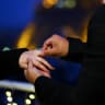 (Illustrative) A man proposes to a woman on a private terrace near the Eiffel Tower in Paris, France, February 10, 2026