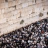 Jews praying for forgiveness (selichot), at the Western Wall in the Old City of Jerusalem, on the eve of Yom Kippur, October 1, 2025