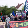 Demonstrators protest an AfD campaign event in Wietze, Lower Saxony, ahead of the local elections, Sept. 10, 2026. 