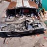 An aerial view shows a damaged boat, as Iran-aligned Houthis seized control of Yemen's port city of Mocha on Thursday, in Mocha, Yemen, in its screengrab taken from a handout video released on September 12, 2026. 