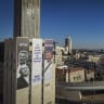 A giant election campaign poster for the Amcha Yisrael party is displayed on a building at the entrance to Jerusalem ahead of the upcoming general elections, September 14, 2026.