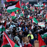 Thousands of pro-Palestine protesters march through the Auckland CBD on September 13, 2025 in Auckland, New Zealand.