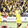 MACCABI TEL AVIV'S Dor Peretz celebrates the 4-1 victory over Hapoel in the Tel Aviv derby, a win that kept the yellow-and-blue atop the Israel Premier League table with a perfect 4-0 record.