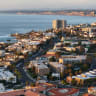 In an aerial view, residential and commercial buildings are seen in the coastal community of La Jolla on August 28, 2026 in San Diego, CA.