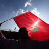 A Morocco's fan waves a flag ahead of the 2026 World Cup round of 32 football match between the Netherlands and Morocco at the Monterrey Stadium in Guadalupe on June 29, 2026; illustrative