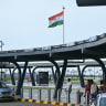 Passengers wait at a taxi stand outside the terminal at Alluri Sitarama Raju International Airport in Andhra Pradesh's Bhogapuram on September 5, 2026.