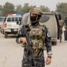 A member of the Syrian security forces carries a weapon while walking near official vehicles in the Hasakah countryside, northeastern Syria on February 9, 2026; Illustrative.