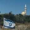 AN ISRAELI flag flies near the West Bank settlement of Karnei Shomron, with a mosque in the Palestinian village of Kafr Lakif in the background. B’Tselem’s new report argues that Israel is making Jewish control of the West Bank increasingly irreversible, an allegation Israel and the IDF reject.