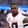 Azeez Al-Shaair of the Houston Texans looks on prior to a game at Gillette Stadium on January 18, 2026 in Foxborough, Massachusetts.