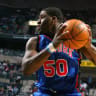 Michael Sweetney #50 of the New York Knicks controls the ball against the Memphis Grizzlies during the game on December 7, 2004 at the FedEx Forum in Memphis, Tennessee.