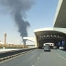 Smoke rises from the fuel storage depot at King Khalid International Airport in the aftermath of Houthi strikes, in Riyadh, Saudi Arabia, September 19, 2026. Picture taken with a mobile phone. 